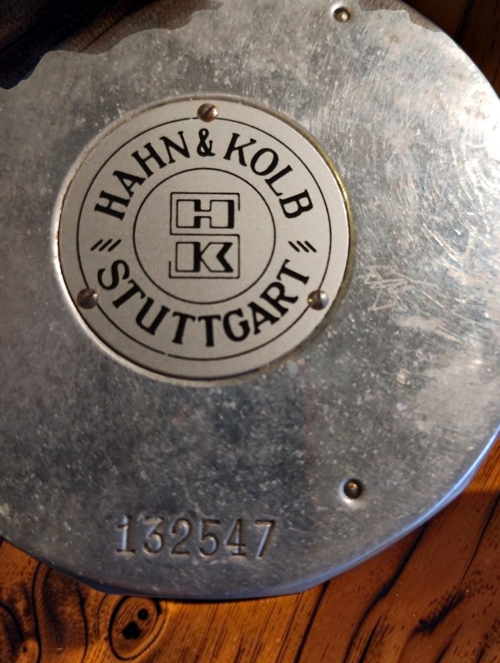 Hasler tachometer back with Hahn & Kolb Stuttgart dealer plate and stamped number 132547
