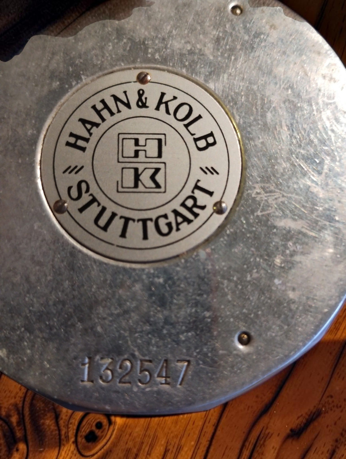 Hasler tachometer back with Hahn & Kolb Stuttgart dealer plate and stamped number 132547

