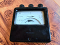 Vintage Siemens phase sequence indicator with R-S-T dial, embossed Siemens logo and black housing
