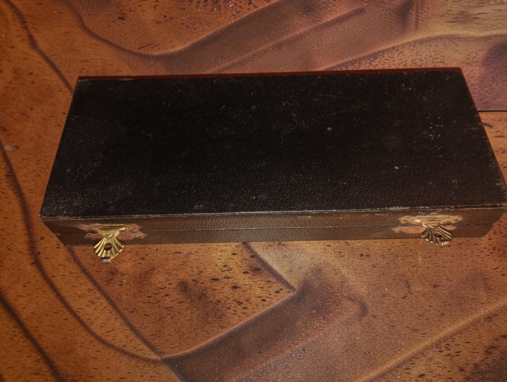 Closed black wooden storage box with two metal clasps for the VIS 25–50 mm outside micrometer.
