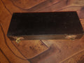 Closed black wooden storage box with two metal clasps for the VIS 25–50 mm outside micrometer.

