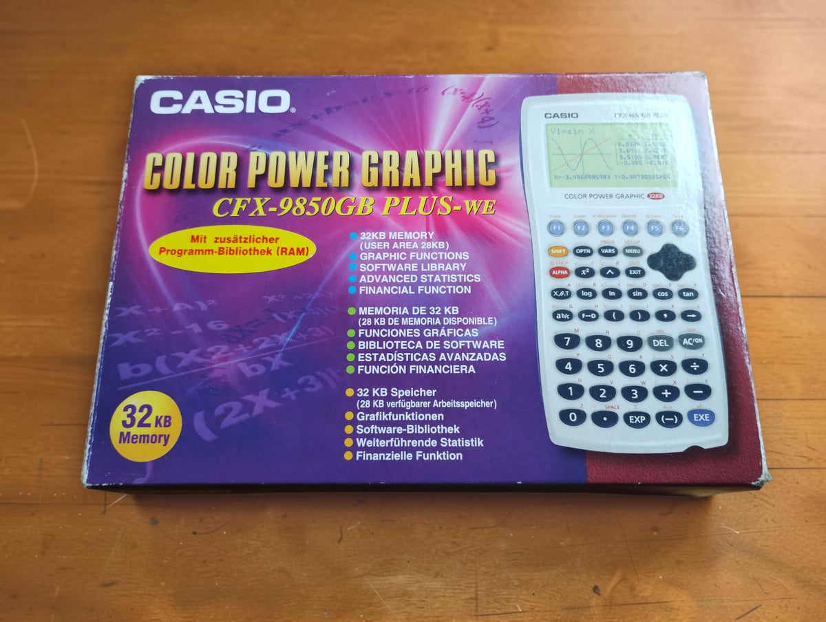 Original box for the Casio CFX-9850GB PLUS-WE White Edition Color Power Graphic calculator.
