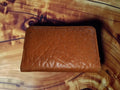 Closed brown leather zippered case for a vintage Siemens relay adjustment tool set
