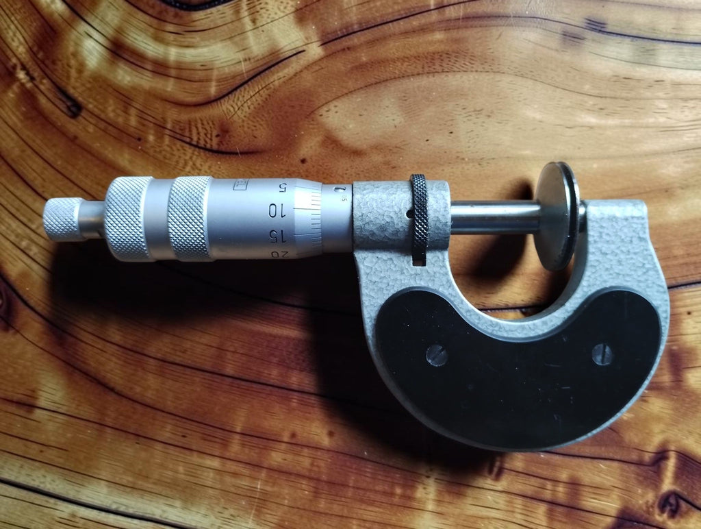 Rear view of the Kunkel 0–20 mm disc micrometer, showing the black frame cover, spindle and graduated thimble.
