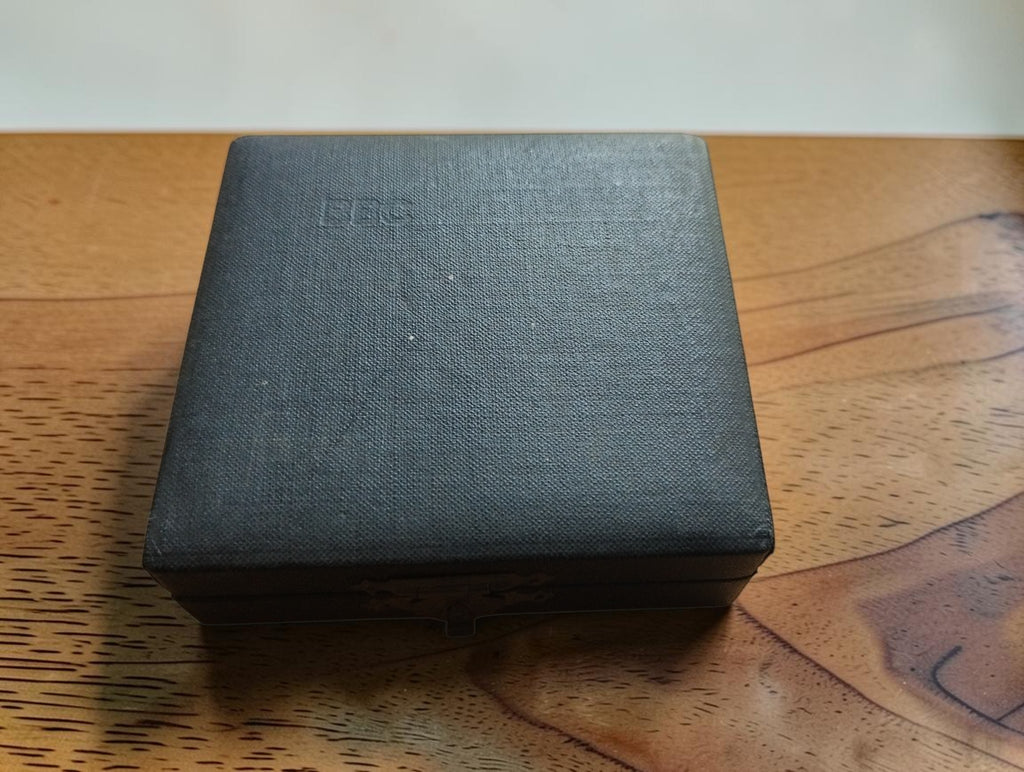 Closed black storage case for the Brown, Boveri & Cie BBC Mannheim mechanical calculating instrument.
