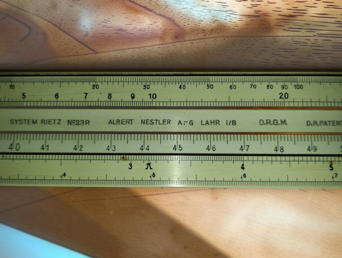 Albert Nestler A.-G. Lahr i/B maker inscription and System Rietz No. 23R marking between the slide rule scales
