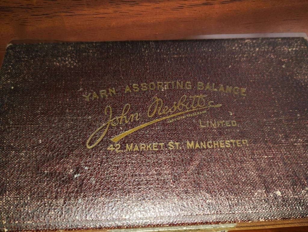Gold-stamped John Nesbitt Limited Yarn Assorting Balance label on the original case lid, Manchester, England.
