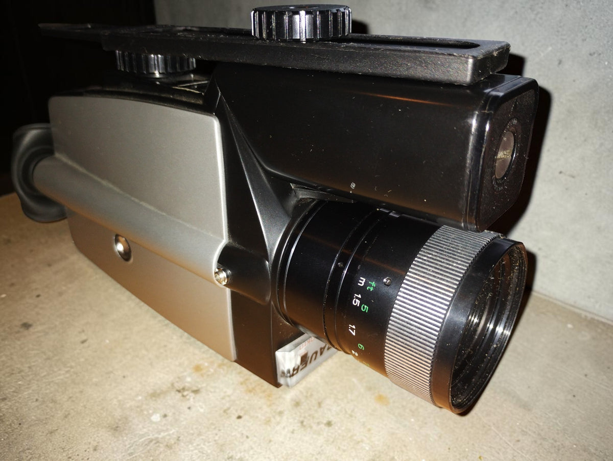 Bauer C8 makro Super 8 movie camera with silver side panel and Neovaron zoom lens, viewed at an angle
