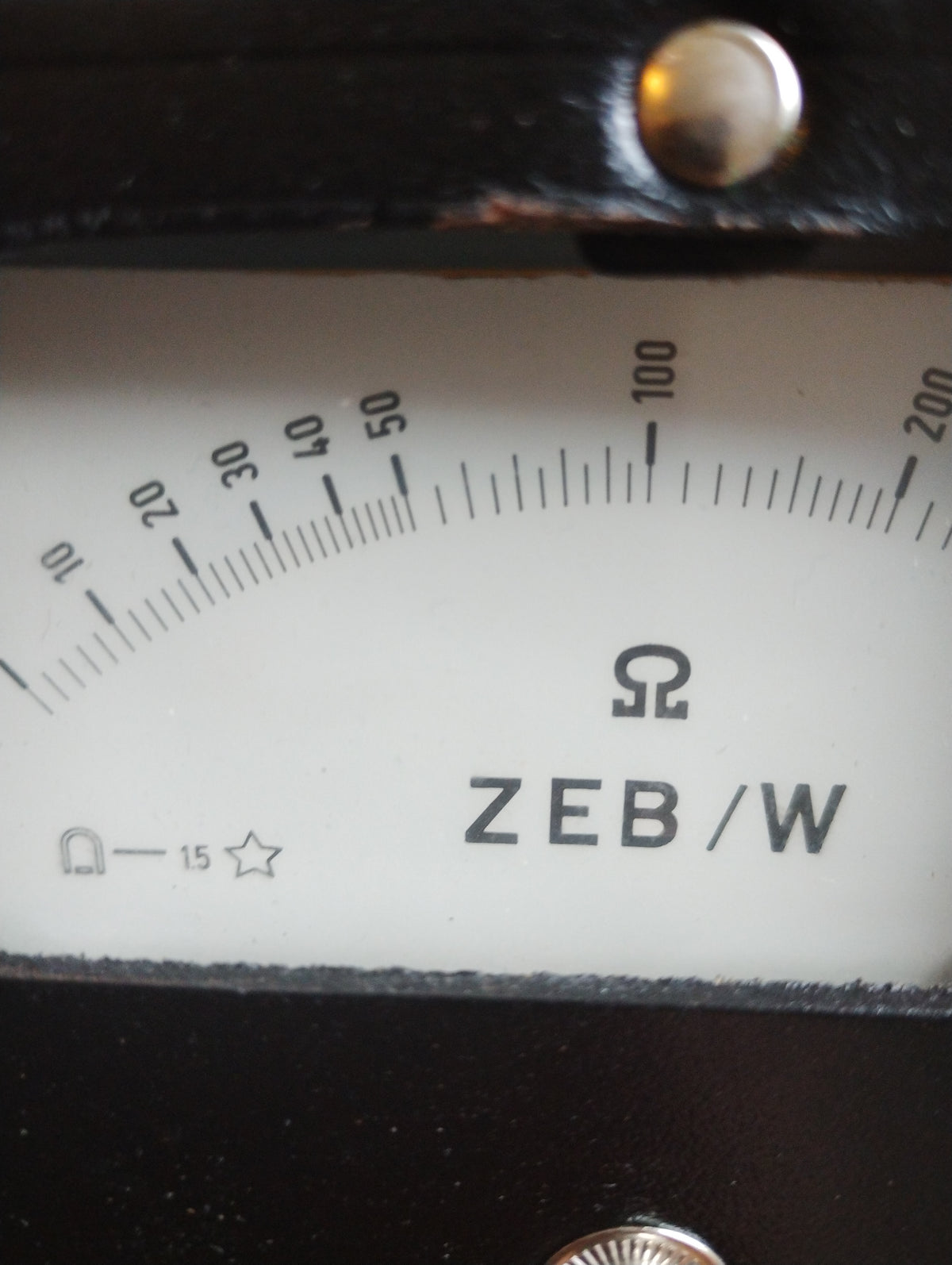 Close-up of the Hartmann & Braun ohmmeter dial showing the ZEB/W model designation, ohm symbol and resistance scale.
