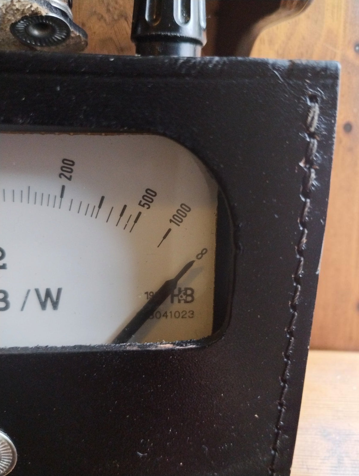 Close-up of the Hartmann & Braun ZEB/W ohmmeter showing the 200, 500 and 1000 ohm scale markings, infinity symbol and pointer.
