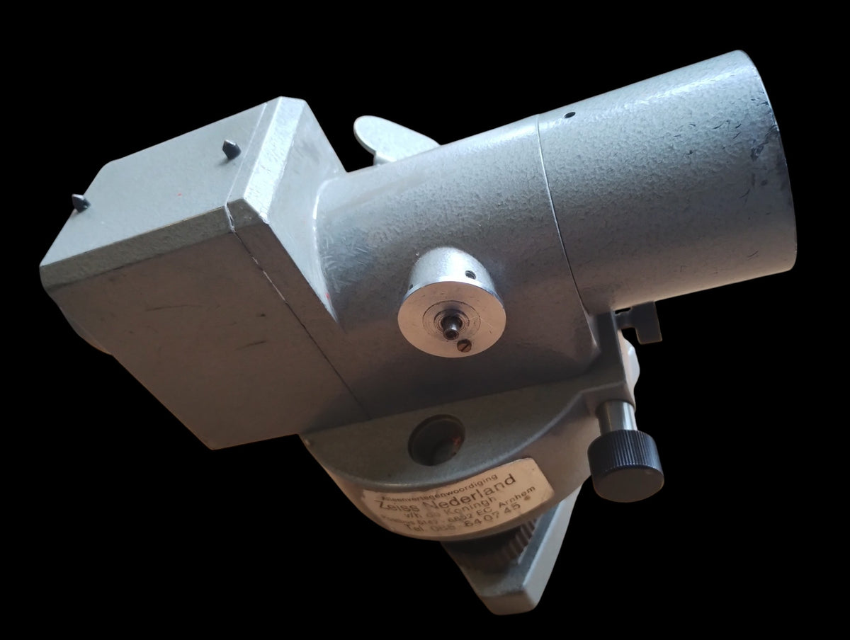 Sokkisha Tokyo B2 automatic level with gray metal housing, telescope and adjustment controls, angled side view.
