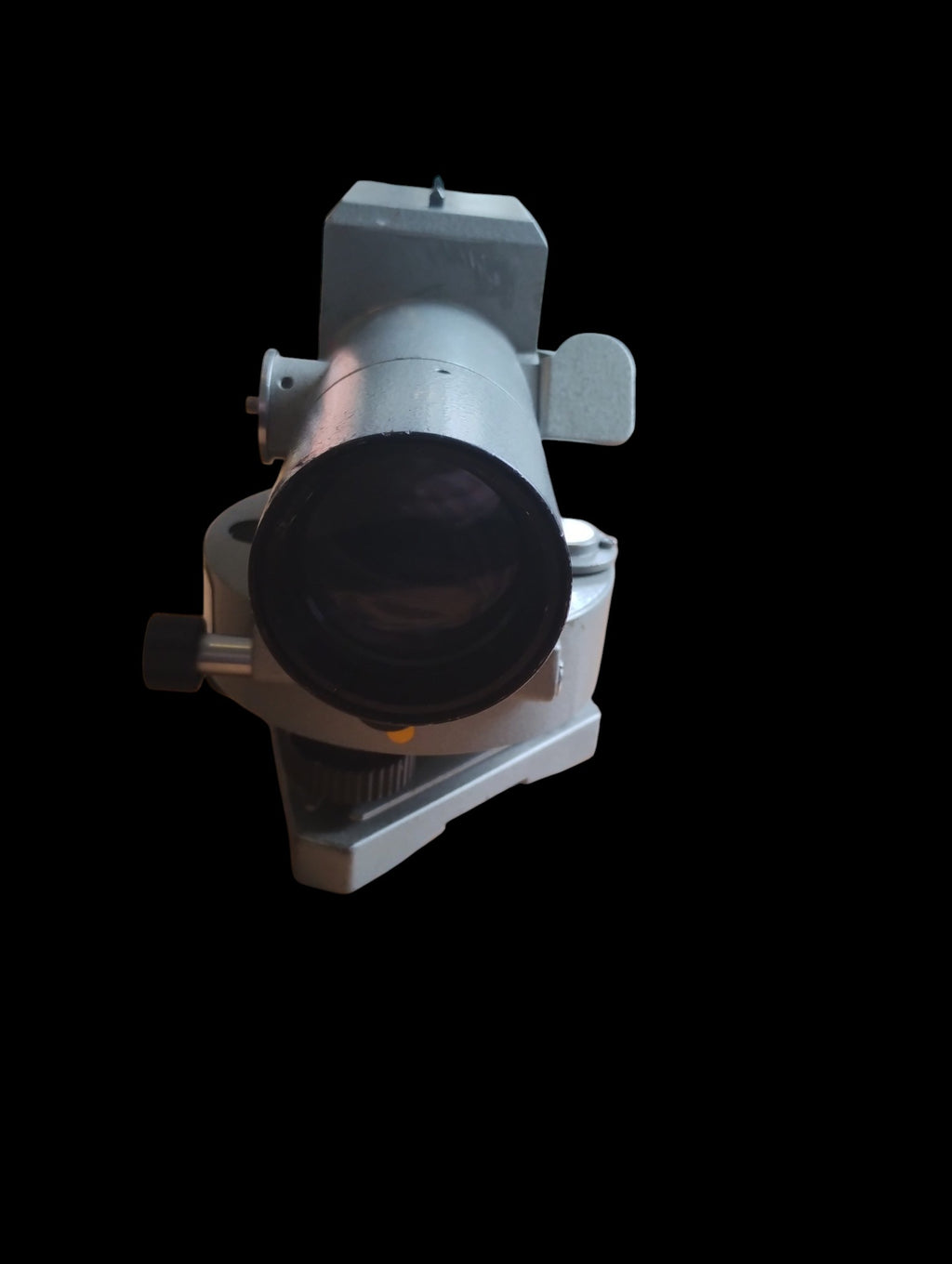 Front view of the Sokkisha B2 automatic level showing the telescope objective lens and leveling base.

