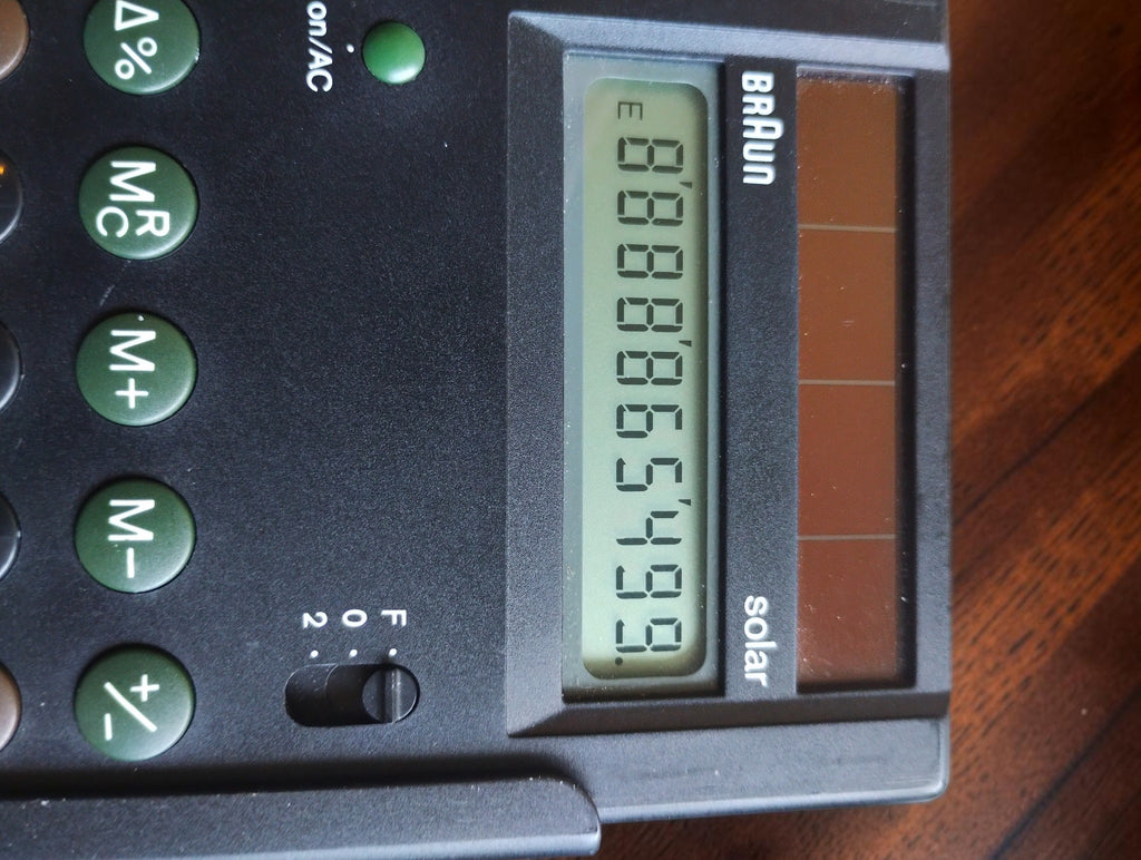 Braun control solar ETS 77 Calculator with Box, Instructions and Sliding Cover
