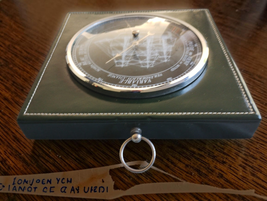 Side view of the Savannah barometer showing the metal hanging ring and thickness of the green surround.
