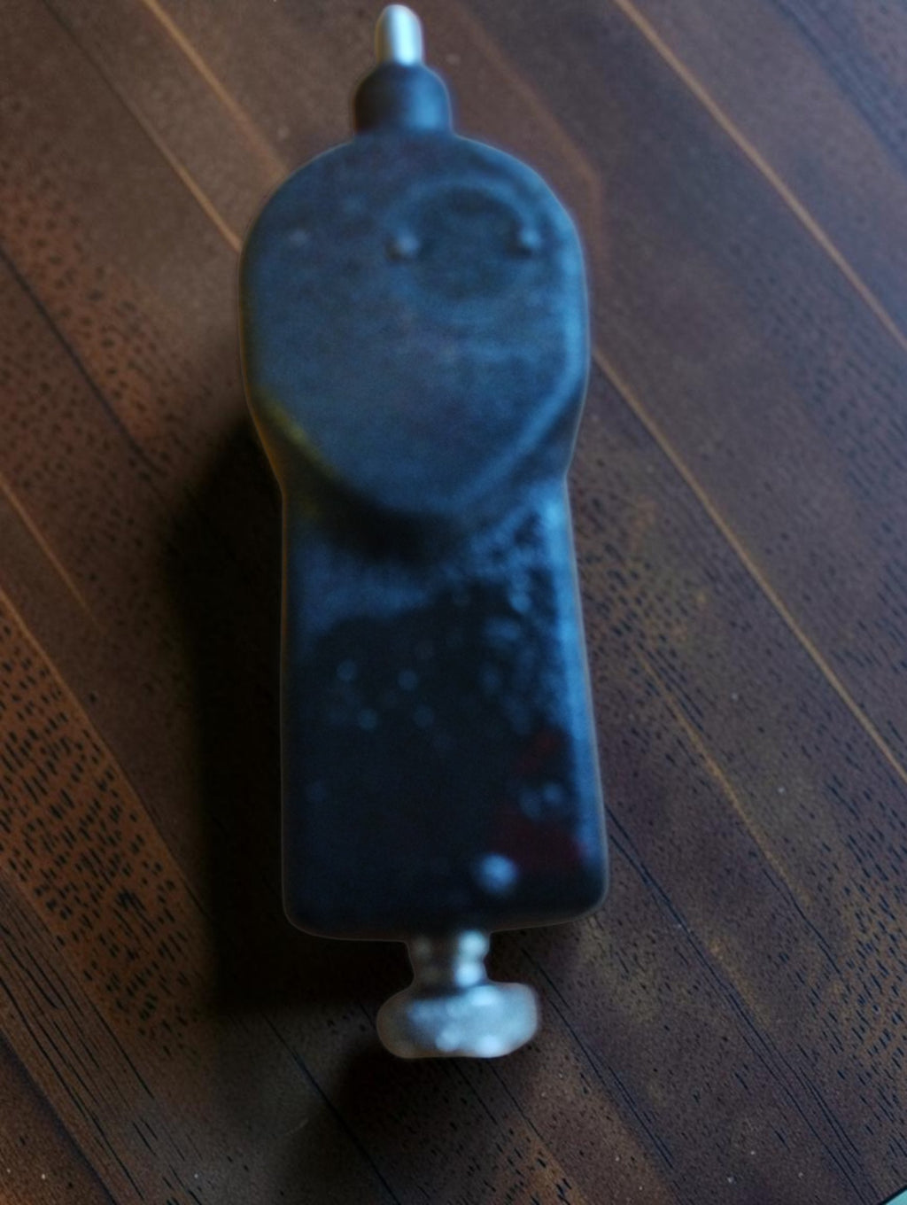 Rear view of the IVO PROBATOR mechanical hand tachometer showing the black finish and visible wear
