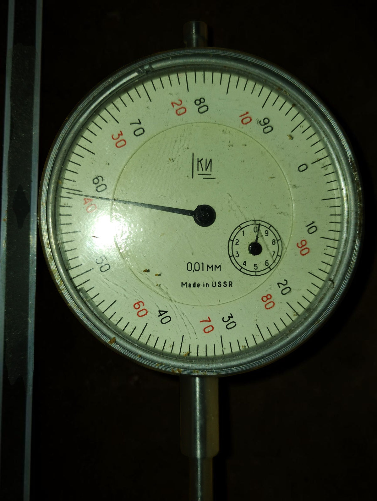 Soviet dial indicator face with 0.01 mm graduations and Made in USSR marking

