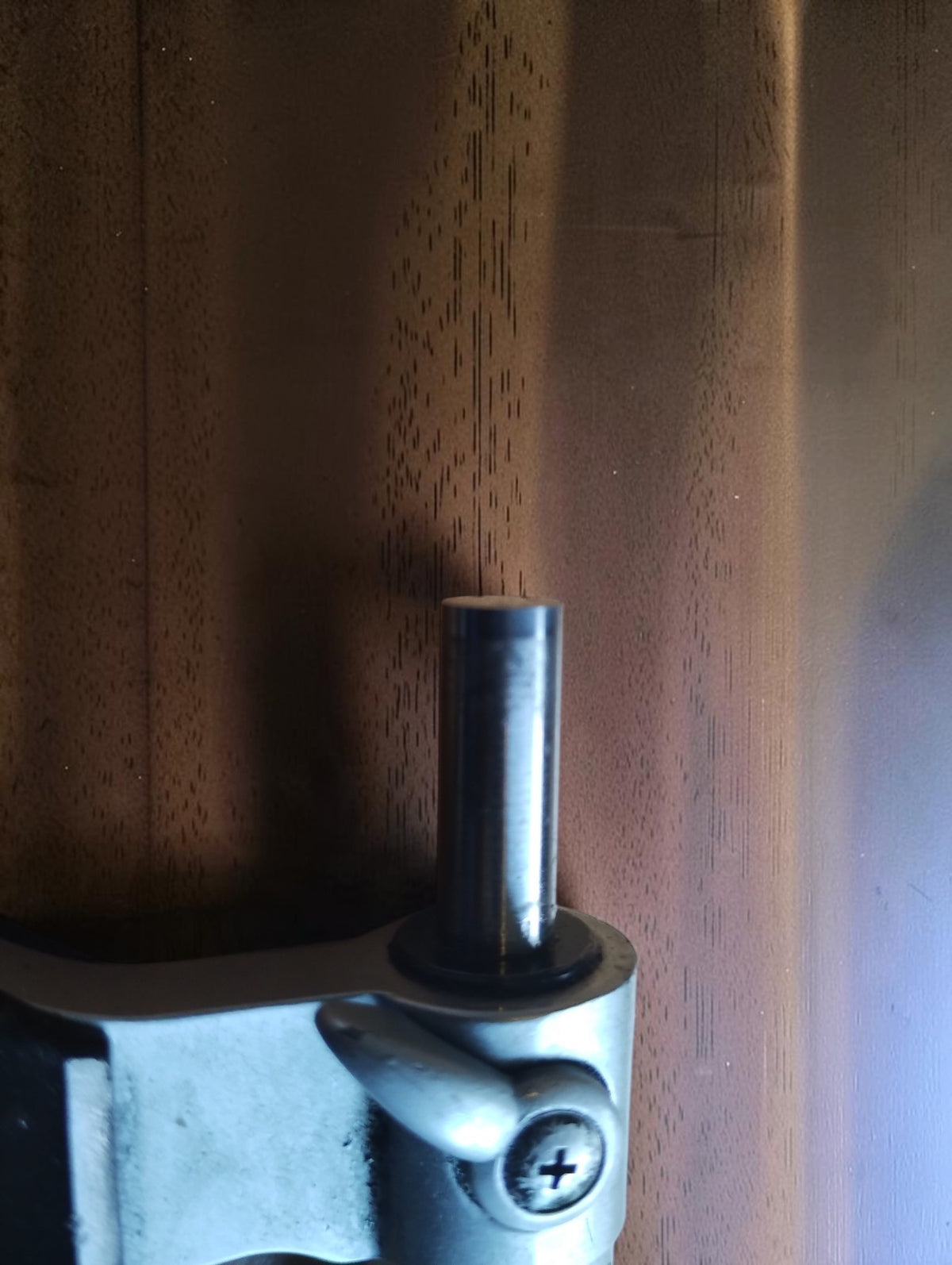 Close-up of the Mitutoyo micrometer’s measuring spindle and locking lever.
