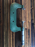 Carl Mahr 40 AW gear tooth micrometer with green frame and disc-shaped measuring faces, full view

