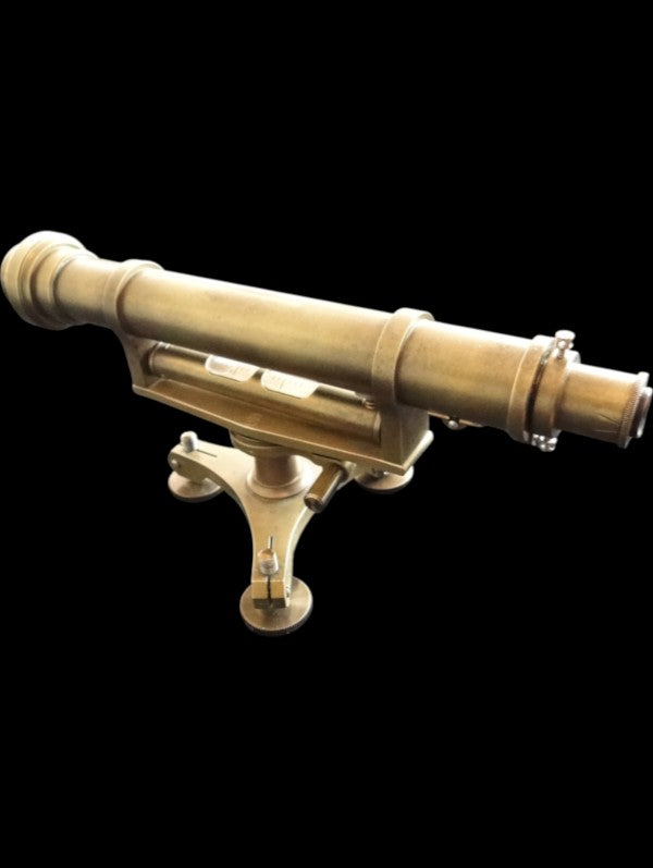 Side view of early 20th-century brass surveyor's levelling instrument