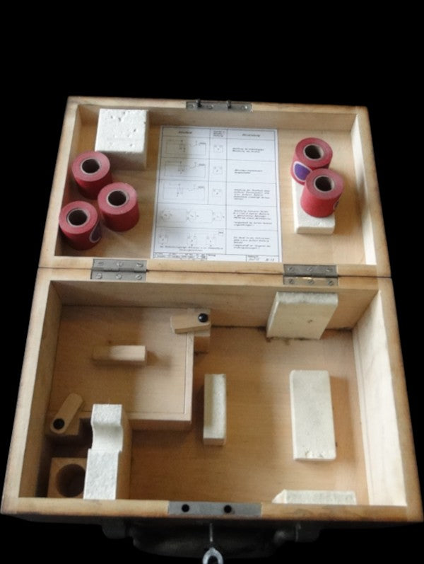 Fitted case with extra wax rolls and accessories